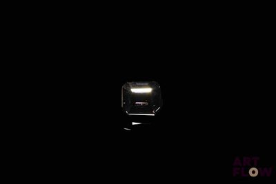 a light that is on in the dark of the room