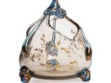 an image of a glass vase sitting on top of a white surface