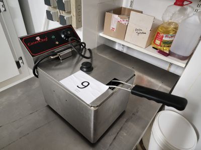 an image of a commercial deep fryer in a kitchen