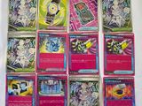 several cards of different types are on a white surface