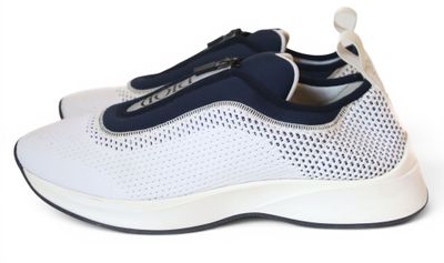 white and blue sneakers on a white background with a white background