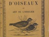 an old book with a picture of two birds on it