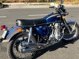 a motorcycle that is parked on the side of the street