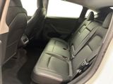 the back seats of a car are empty in the back of the car