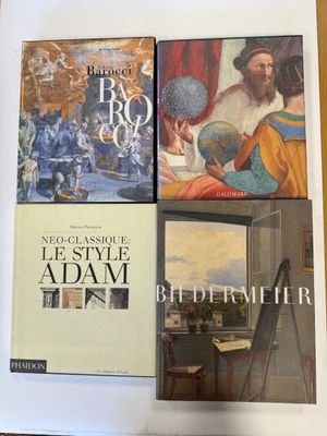 two books are sitting on a table next to each other