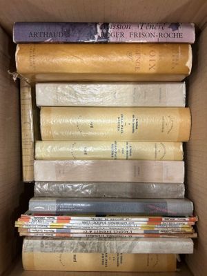 a box full of books sitting on a table