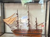 a model of a ship in a glass case