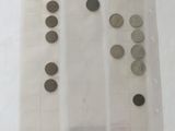 a lot of coins that are on the table