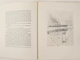 an open book with a drawing of a train on it