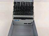 a set of drill drills in a case on a white surface