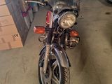 a motorcycle that is parked in a garage