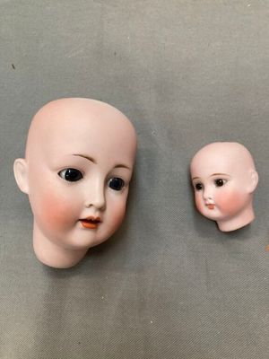 Une tête porcelaine allemande marqué Harmus 5 avec yeux dorm…
