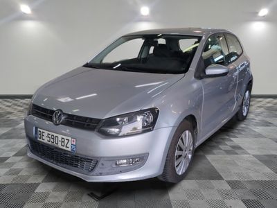 a picture of a silver car in a showroom