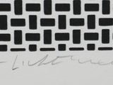 black and white photograph of a computer keyboard with a handwritten message