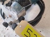 a picture of a table with a corded sander on it