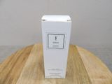 a picture of a white box on a wooden table