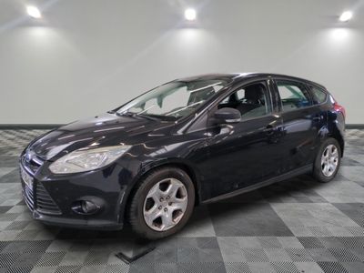 a picture of a black car parked on a checkered floor