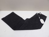 a pair of black jeans sitting on top of a white table