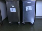 two trash cans sitting next to each other on the floor