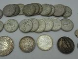 a close up of a bunch of coins on a table