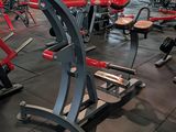 a gym with a lot of exercise equipment in it