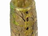 a gold vase with a tree on it on a white background