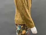 an image of a mannequin wearing a skirt and jacket
