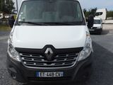 a white van that is parked in a parking lot