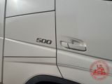 an image of a white truck parked in a parking lot