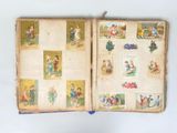 an open book with pictures of children on it