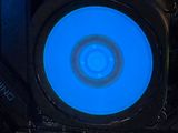 a close up of a camera with a blue light