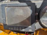 a picture of a close up of a camera on a construction vehicle