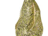 yellow and green ceramic sculpture of a pear on a white background