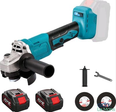 a corded angle grinder with tools on a white background