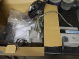 a box with a bunch of wires in it on a table