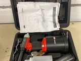 an image of a tool kit in a black case on a table