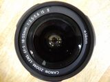 a close up view of a camera lens on a table