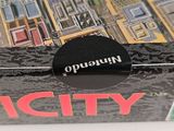 a picture of a box with a picture of a city on it