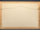 an old picture frame with a piece of paper taped to it