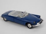 a blue toy car on a white surface