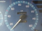 a close up of a speedometer on a car ' s dashboard