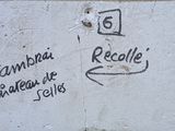 a sign on the wall that says to recolle and to recolle