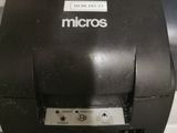 a black printer that is sitting on top of a counter