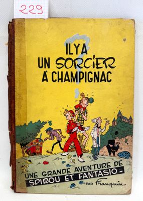 an old book with a picture of a man and a dog on it