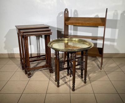 two tables and a chair in a room