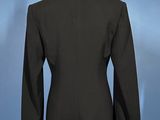 an image of a woman ' s black jacket on a mannequin mannequin mannequin mannequin mannequin mannequin mannequin