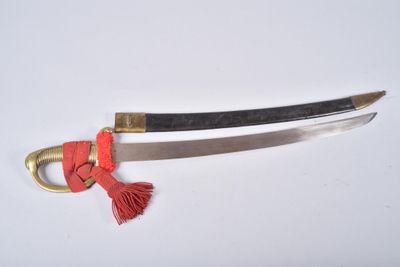 a picture of a sword with a red tassel on it