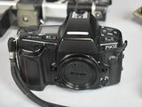 a camera that is sitting on a table next to other cameras