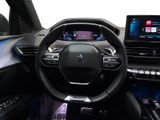 the interior of a car with a steering wheel and a touch screen