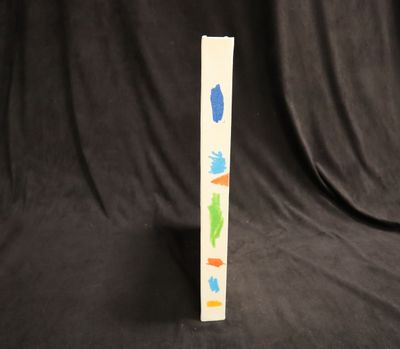 une image représentant une grande feuille de papier sur laquelle figurent des formes de différentes couleurs